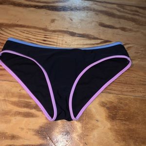 black with blue on the top and purple on bottom. to big on me.